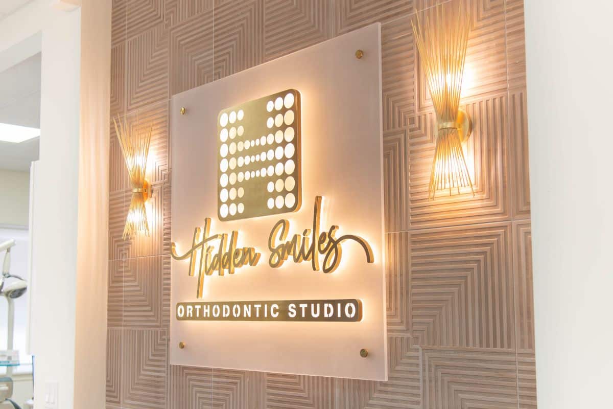 Hidden-smiles-melville-office-photos-indoor-lit-signage Hidden smiles melville office indoor lit signage