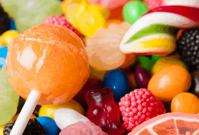 Foods to avoid with braces (and what you can enjoy! ) 12 Assortment of hard candy, representing foods to avoid with braces