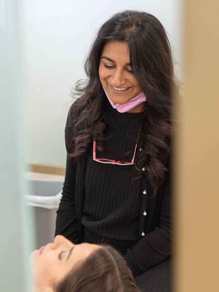 Hidden-smiles-botox-tmj (2) Dentist laughing and smiling at patient